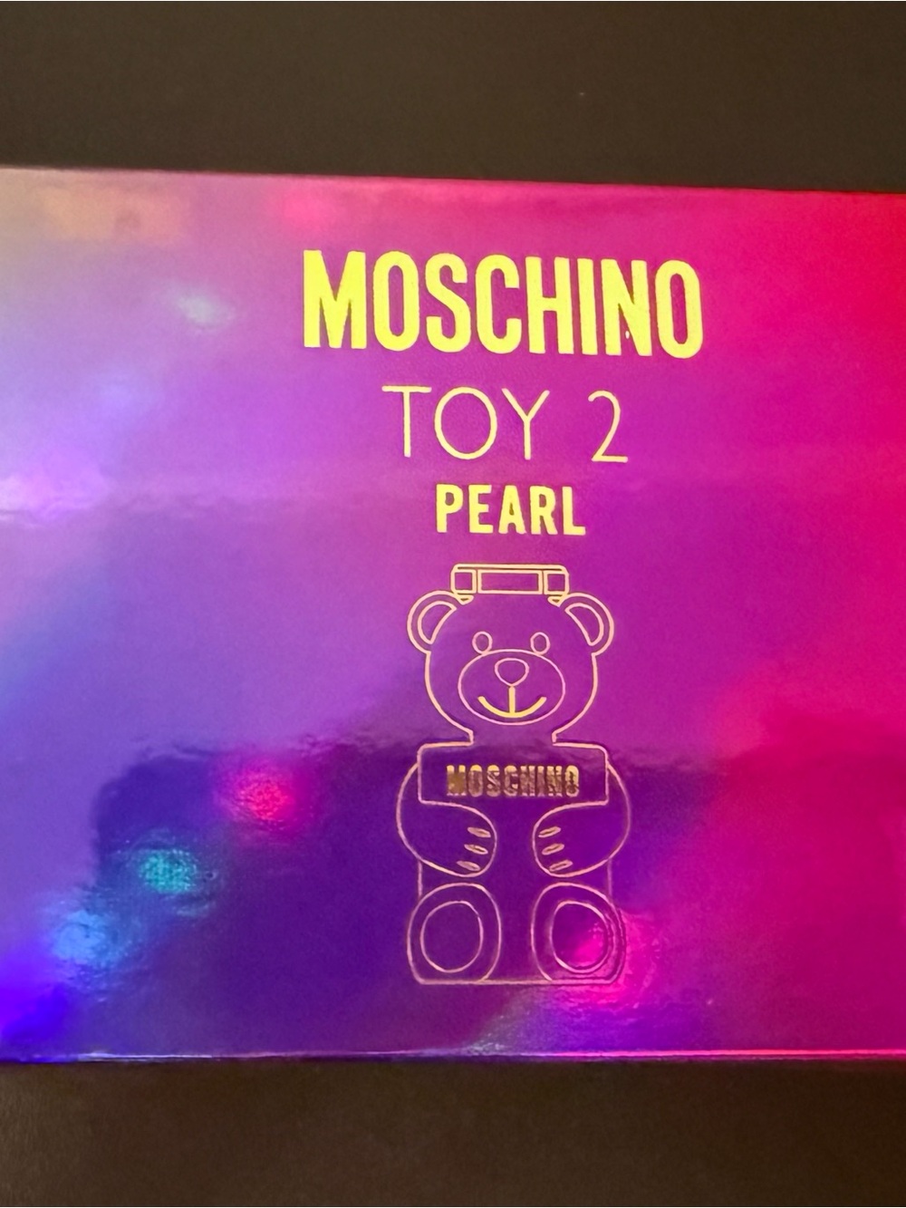 Moschino Toy 2 Pearl Kids Packaging in Pink and Purple Holographic Finish